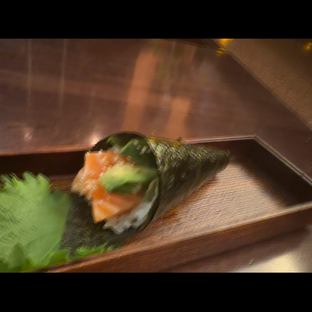 Salmon and Avocado Hand Roll.